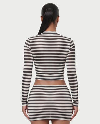 Vestido mini de malla con aberturas y detalle de cadena de JUVIA