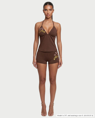 Vestido mini de malla con aberturas y detalle de cadena de JUVIA