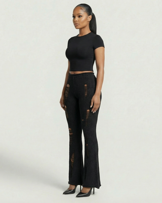 Pantalones acampanados de punto acanalado rotos ALOMA