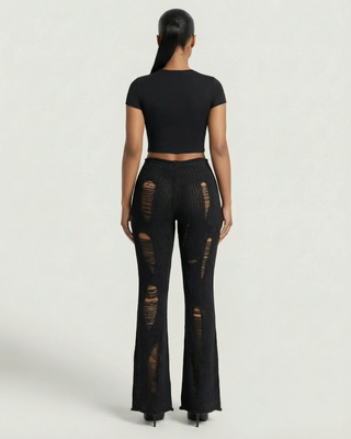 Pantalones acampanados de punto acanalado rotos ALOMA