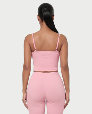 Vestido mini de malla con aberturas y detalle de cadena de JUVIA