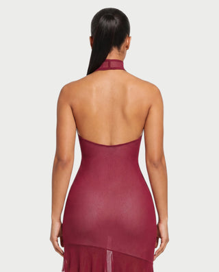 Vestido mini de malla con aberturas y detalle de cadena de JUVIA