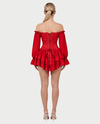 Vestido mini de malla con aberturas y detalle de cadena de JUVIA