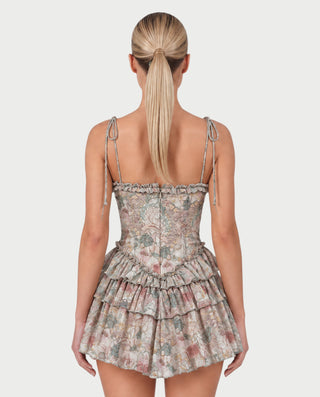 Vestido mini de malla con aberturas y detalle de cadena de JUVIA