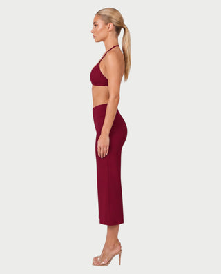 Vestido mini de malla con aberturas y detalle de cadena de JUVIA