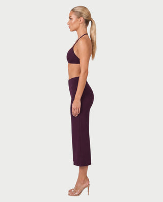 Vestido mini de malla con aberturas y detalle de cadena de JUVIA
