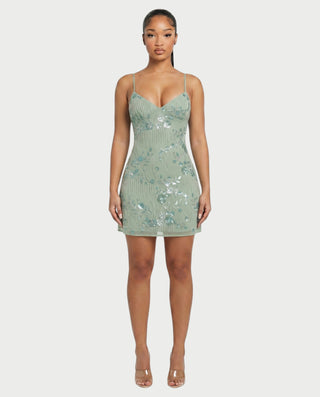 Vestido mini de malla con aberturas y detalle de cadena de JUVIA