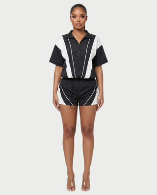 Conjunto deportivo de top con cremallera y pantalones cortos en contraste LOIRA