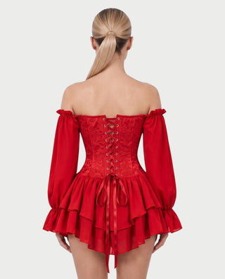 Vestido mini de malla con aberturas y detalle de cadena de JUVIA