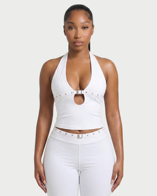 Conjunto de top con cuello halter y pantalón con tachuelas de SIANE 