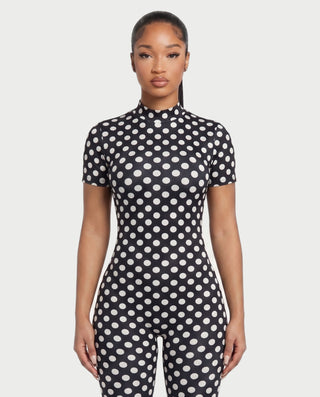 ELIZONA Polka Dot Mock Neck Open-Back Romper