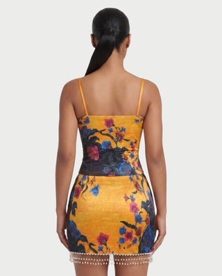 Vestido mini de malla con aberturas y detalle de cadena de JUVIA