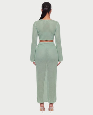 Vestido mini de malla con aberturas y detalle de cadena de JUVIA