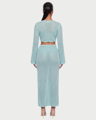 Vestido mini de malla con aberturas y detalle de cadena de JUVIA