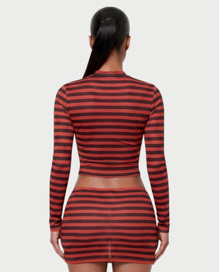 Vestido mini de malla con aberturas y detalle de cadena de JUVIA