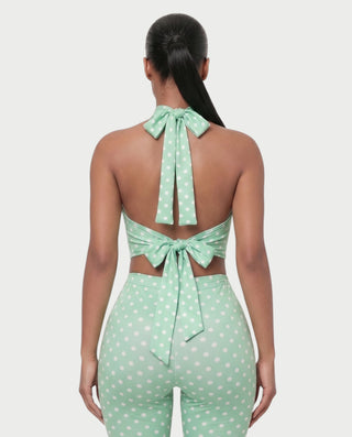 Vestido mini de malla con aberturas y detalle de cadena de JUVIA