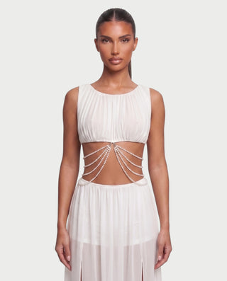 Vestido mini de malla con aberturas y detalle de cadena de JUVIA
