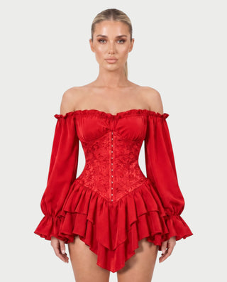 Vestido mini de malla con aberturas y detalle de cadena de JUVIA