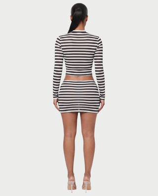 Vestido mini de malla con aberturas y detalle de cadena de JUVIA