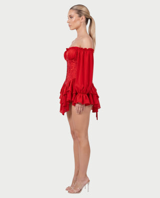 Vestido mini de malla con aberturas y detalle de cadena de JUVIA
