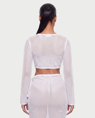 Vestido mini de malla con aberturas y detalle de cadena de JUVIA