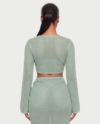 Vestido mini de malla con aberturas y detalle de cadena de JUVIA