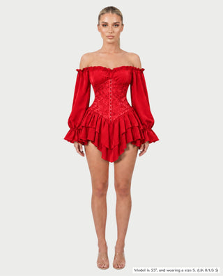 Vestido mini de malla con aberturas y detalle de cadena de JUVIA