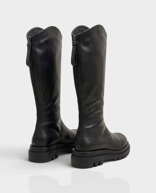 EMRYN Curved Top Knee-High Lug Sole Boots