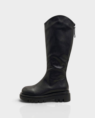 EMRYN Curved Top Knee-High Lug Sole Boots