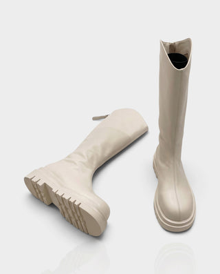 EMRYN Curved Top Knee-High Lug Sole Boots