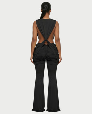 DERYN Plunge Twist Front Draped Flare Jumpsuit