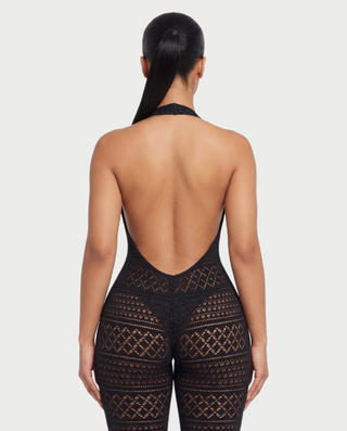 SARI Patterned Flare Jumpsuit