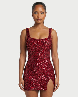 Vestido mini de malla con aberturas y detalle de cadena de JUVIA