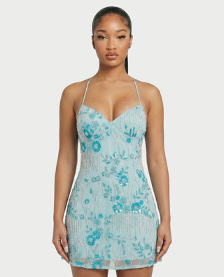 Vestido mini de malla con aberturas y detalle de cadena de JUVIA