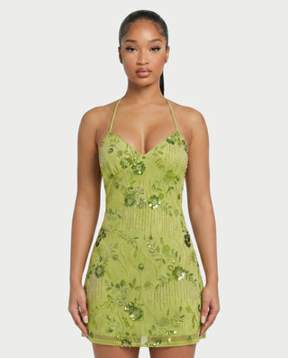 Vestido mini de malla con aberturas y detalle de cadena de JUVIA