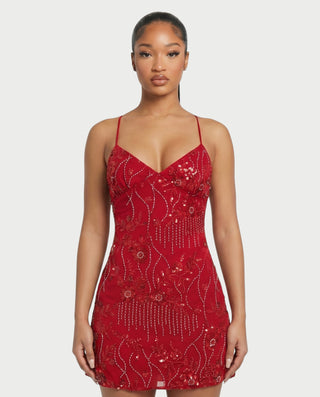 Vestido mini de malla con aberturas y detalle de cadena de JUVIA