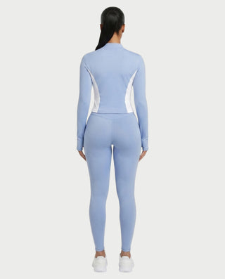 Conjunto de top y leggings con cremallera en contraste KAYLINA