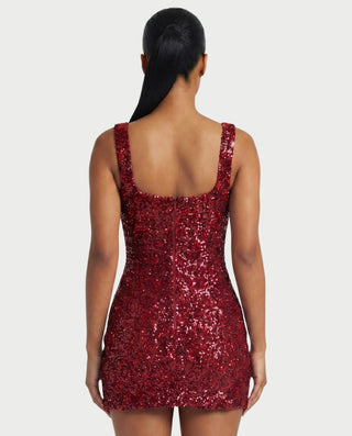 Vestido mini de malla con aberturas y detalle de cadena de JUVIA