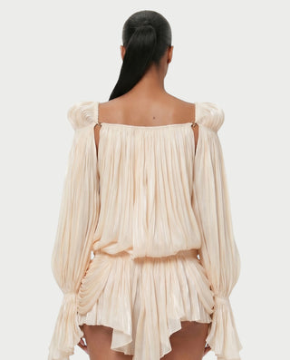 Vestido mini de malla con aberturas y detalle de cadena de JUVIA