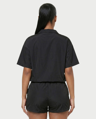 Conjunto deportivo de top con cremallera y pantalones cortos en contraste LOIRA