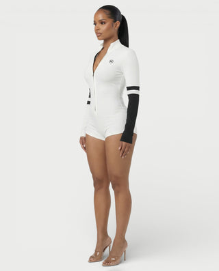 Mono ajustado de punto con cuello alto y cremallera de NICOLE