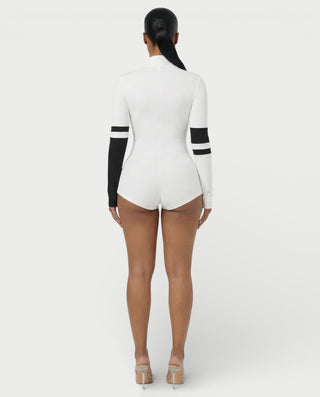 Mono ajustado de punto con cuello alto y cremallera de NICOLE