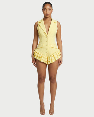 Mono de esmoquin con volantes a medida de NIVARA