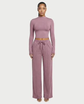 Chaleco corto con hebilla frontal de piel sintética QUELLA