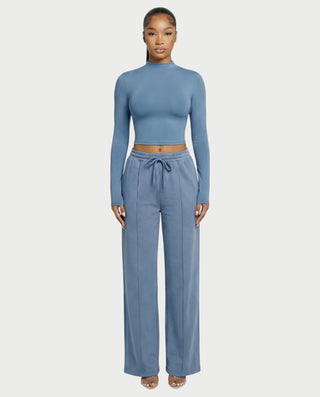 Chaleco corto con hebilla frontal de piel sintética QUELLA