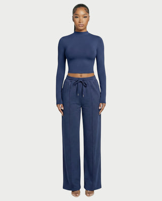 Chaleco corto con hebilla frontal de piel sintética QUELLA