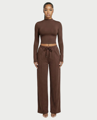 Chaleco corto con hebilla frontal de piel sintética QUELLA