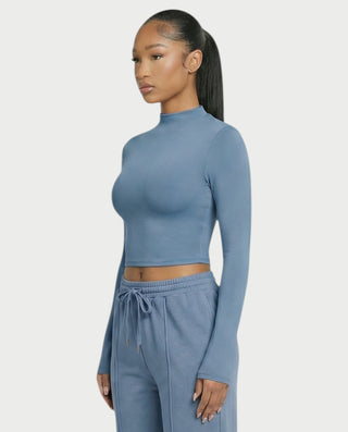 Chaleco corto con hebilla frontal de piel sintética QUELLA