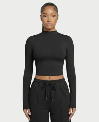 Chaleco corto con hebilla frontal de piel sintética QUELLA