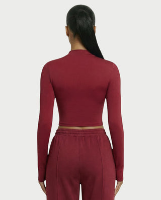 Chaleco corto con hebilla frontal de piel sintética QUELLA